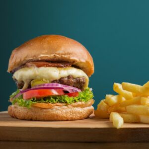 A delicious cheeseburger served with crispy golden french fries, perfect for a tasty meal.